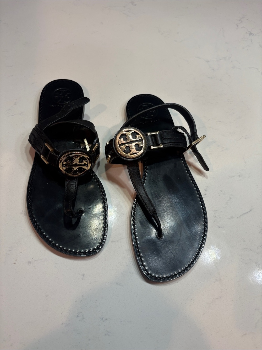 Tory Burch Black Leather Logo Thong Sandals with Gold Accents